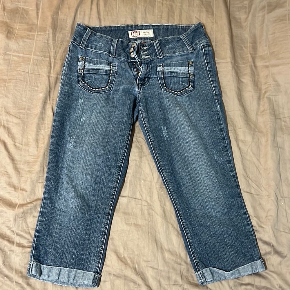 LEI Ashley low rise capris with folded hem and minor distressing.
